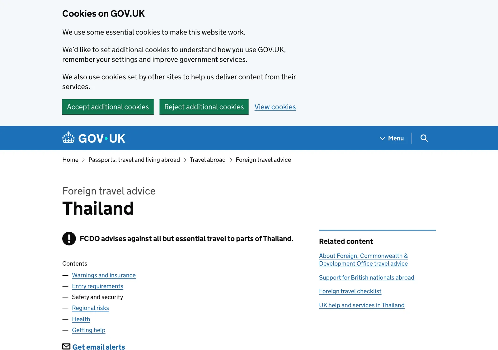 Government travel advice page for Thailand with a cookie notice, a contents list and a warning banner at the top.