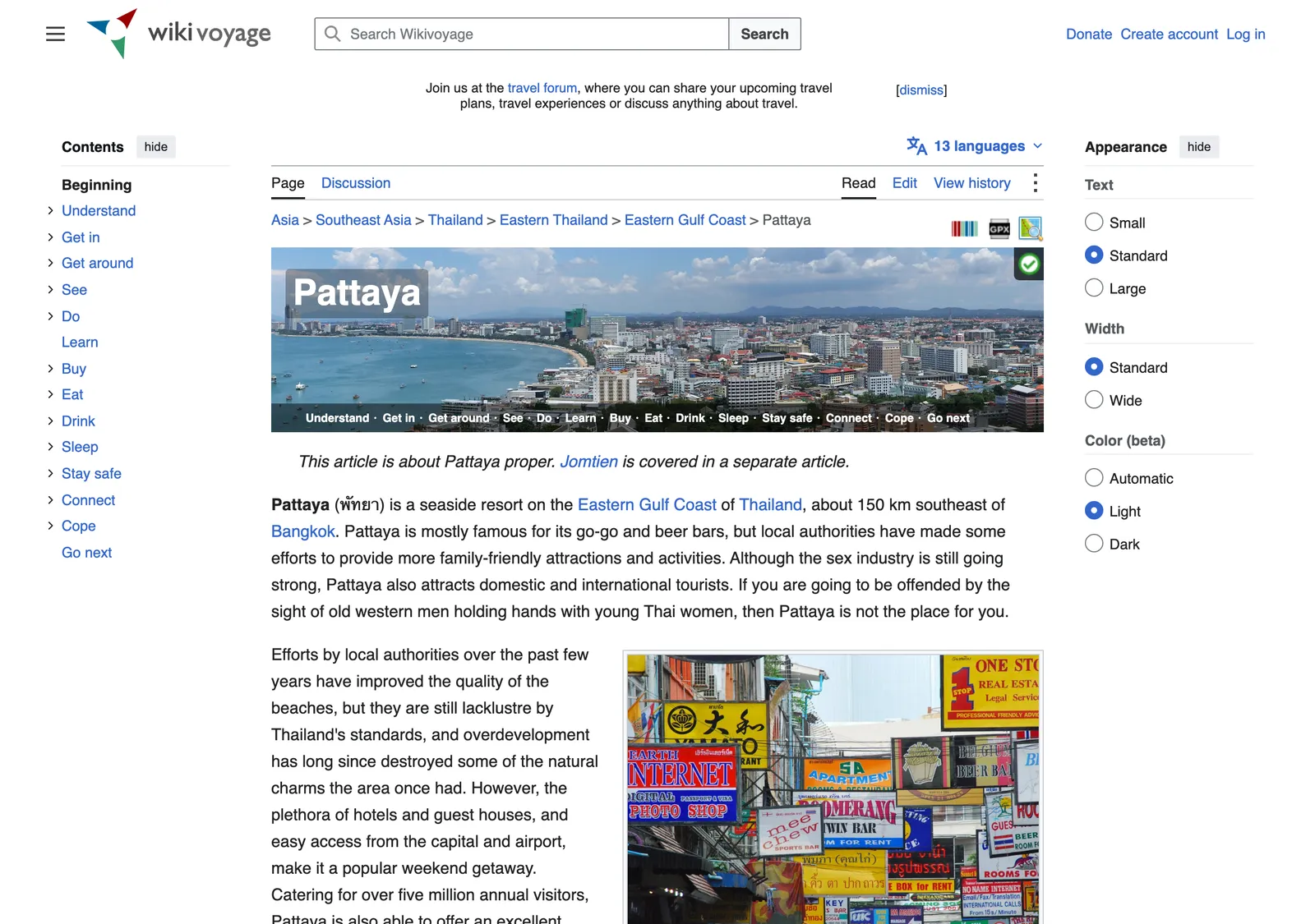 Travel wiki page for Pattaya with a contents list on the left, a banner photo of the bay and an introduction to the resort.